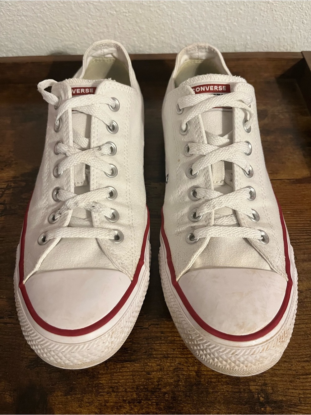 Converse men’s  White Low Top Canvas Sneakers with Red Trim